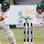 a group of men playing cricket